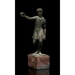 A GERMAN OR ITALIAN PATINATED BRONZE FIGURE OF A ROMAN SLAVE Circa 19th Century A.D. Provenance: