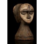 A KWESE JANIFORM FIGURE, DEMOCRATIC REPUBLIC OF CONGO The two stylised heads set on a high