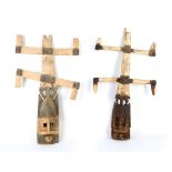 TWO DOGON ‘KANAGA’ MASKS, MALI The typical vertical crest with two pairs of stylised arms directed