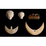 A GROUP OF EGYPTIAN ARTEFACTS Late Period, circa 664-332 B.C. Including two limestone heads, with
