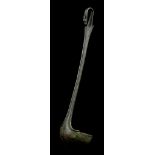 A ROMAN BRONZE LADLE Circa 1st-2nd Century A.D. With shallow bowl, the handle terminating in a