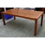 A rectangular fruitwood table, the top consisting