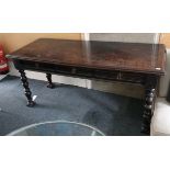 A Victorian oak side table, with three drawers, ra