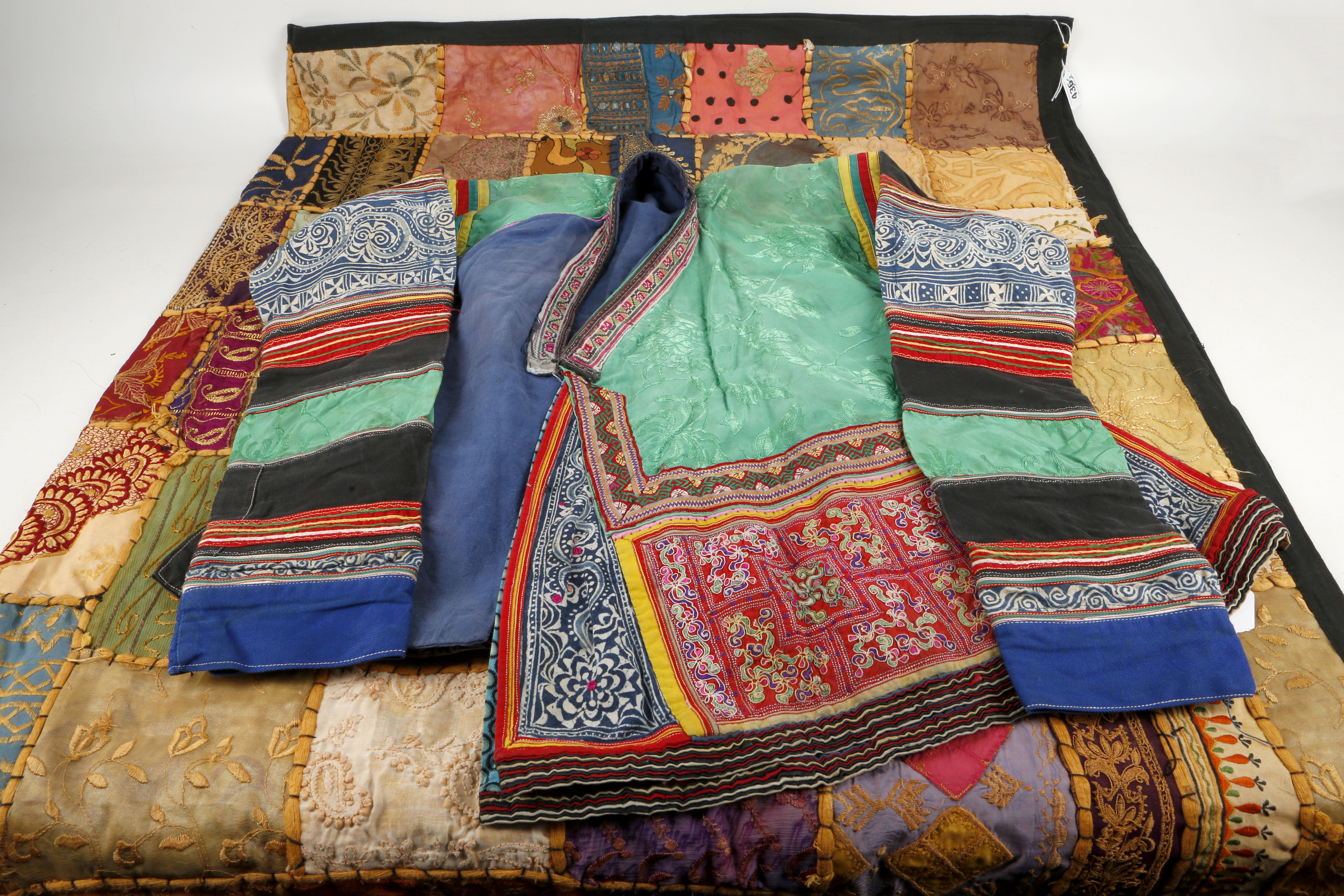 A Chinese jacket, multi coloured and materials and