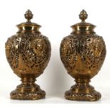 A pair of 19th century pierced bronze, ovoid foote