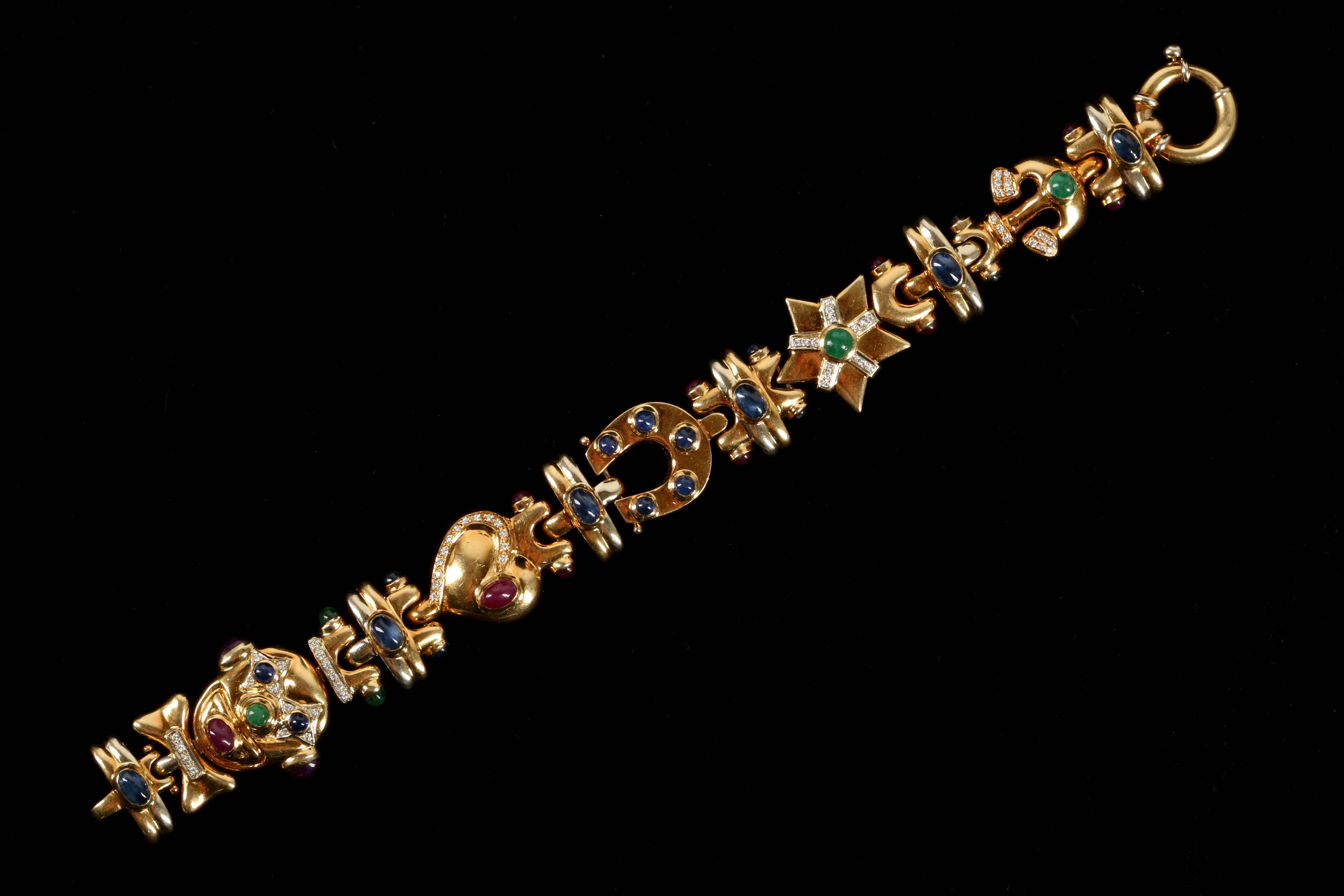 An 18ct gold articulated bracelet, set with sapphi