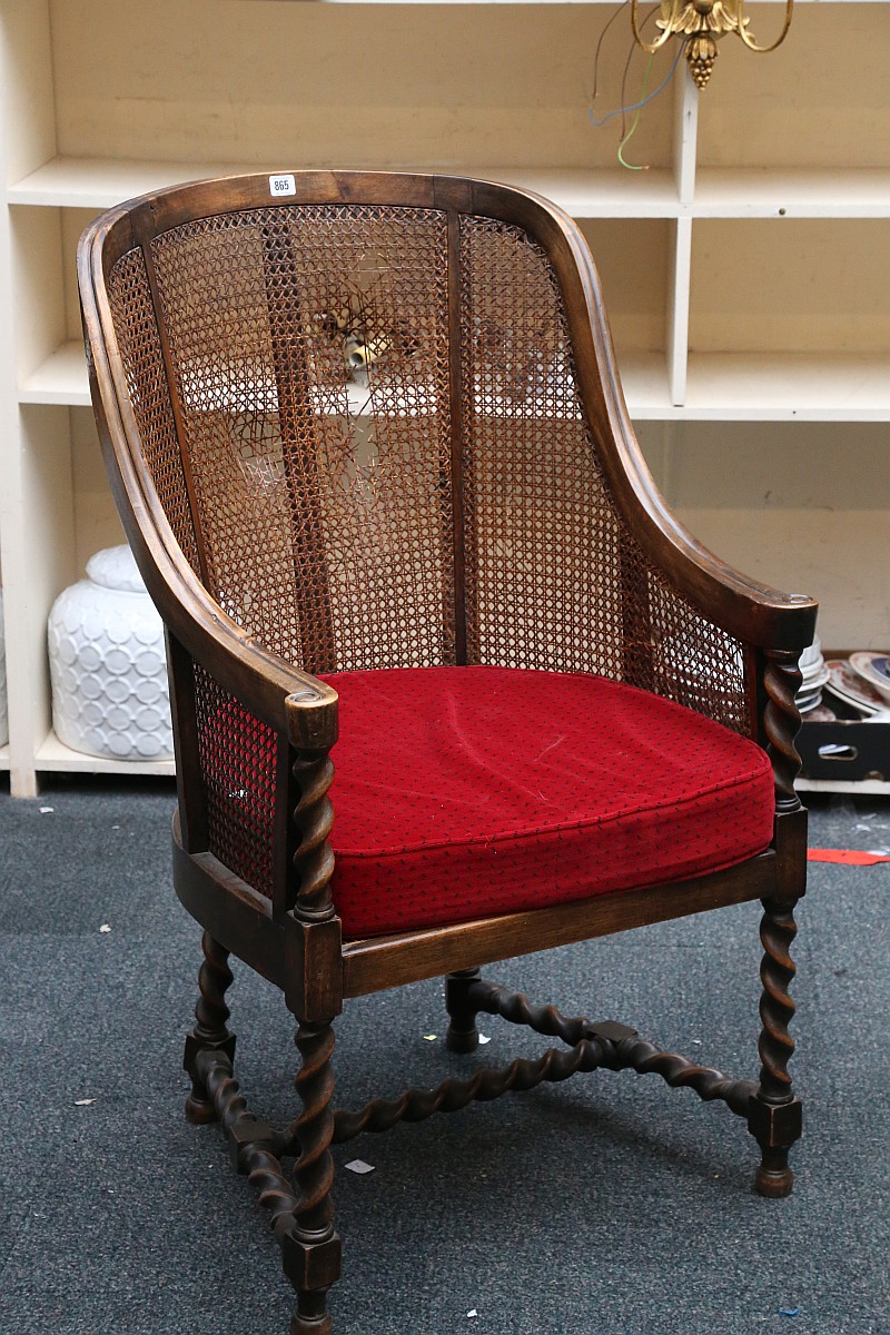 An Edwardian period continental armchair with cane
