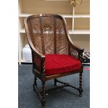 An Edwardian period continental armchair with cane