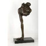 A modernish style bronze of partial torso, support