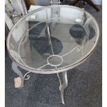 A 20th century cast iron and glass oval shaped top