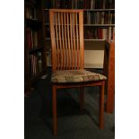 A set of 6 contemporary beech comb back dining chairs, tapestry seats, block legs (6).