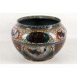 A Japanese cloisonne enamel jardiniere, the body decorated by lappets enclosing birds and dragons,