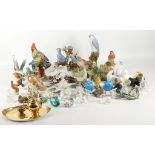 A large collection of interesting ceramic and glass figures of birds, together with glass figures of