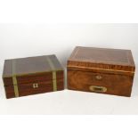 A 19th century travelling vanity box, brass banded rosewood revealing burgundy leather rest with