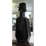 A large vintage black wooden cello case, 135cm high.