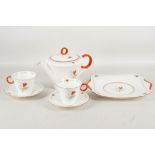 An Art Deco shelly bone chine lète tea service, comprising teapot, two cups and saucers and matching