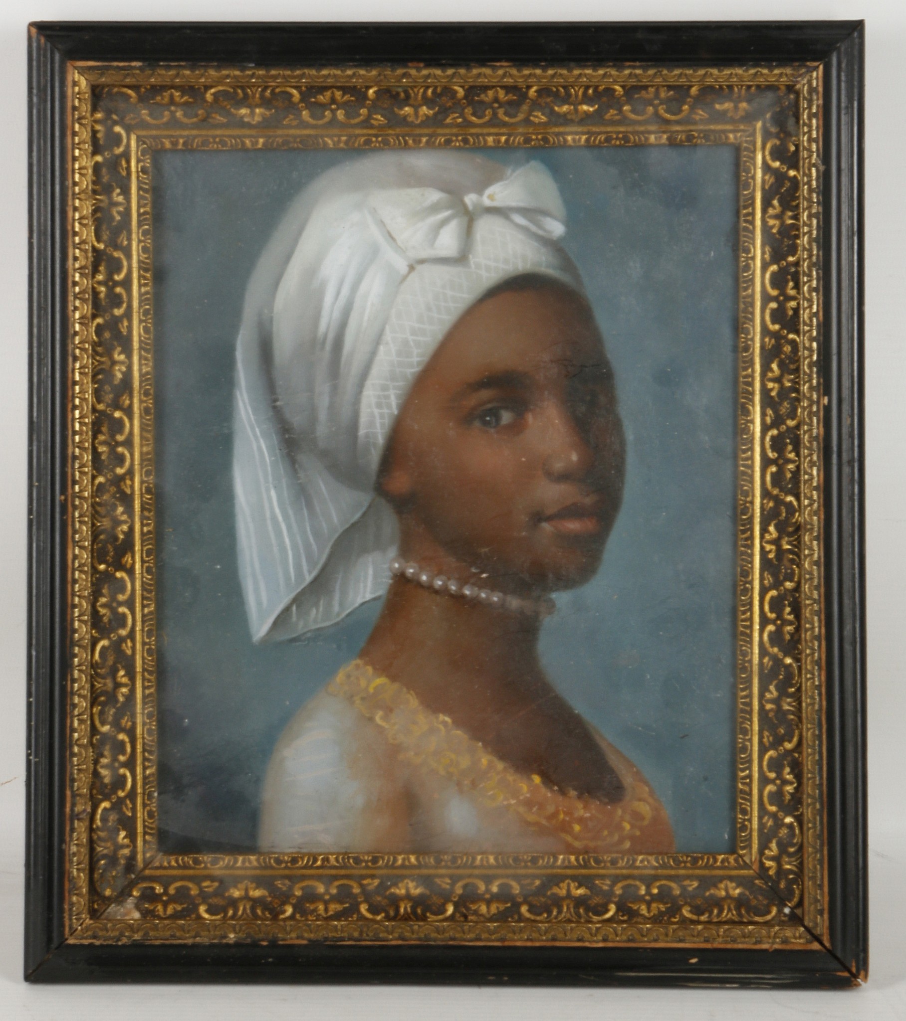 An oil painting study of a colonial female slave, Hogarth framed, 44 x 19.5cm.