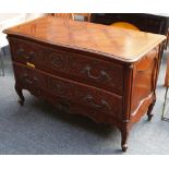 An early 20th century, rococo style serpentine front sideboard, having parquetry top and 2 carved