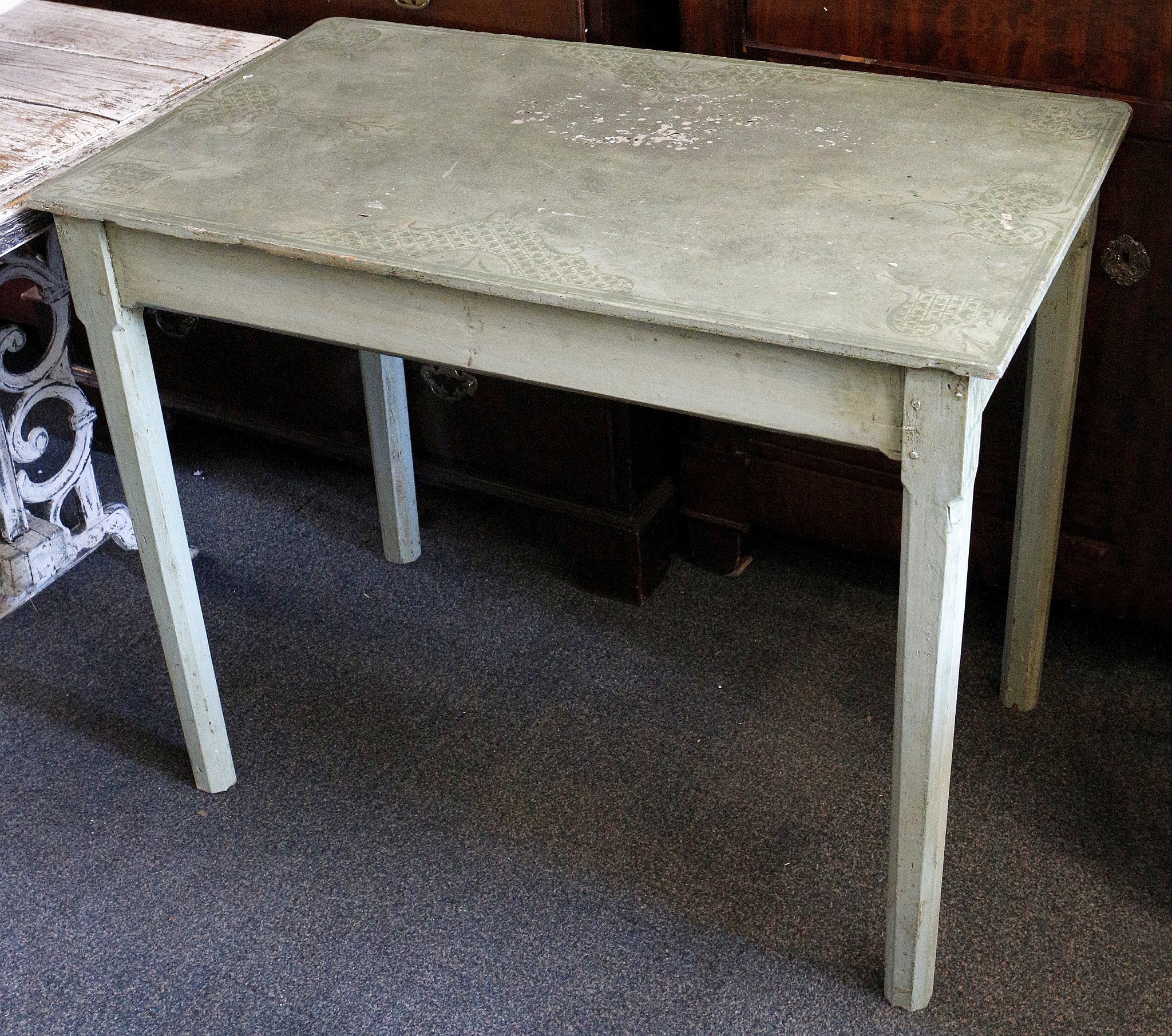 A French early 20th century painted study bureau plat / desk table, over-painted decoration, twin