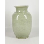 A Chinese late Qing dynasty, incised vase with attractive floral decoration, 29cm high.