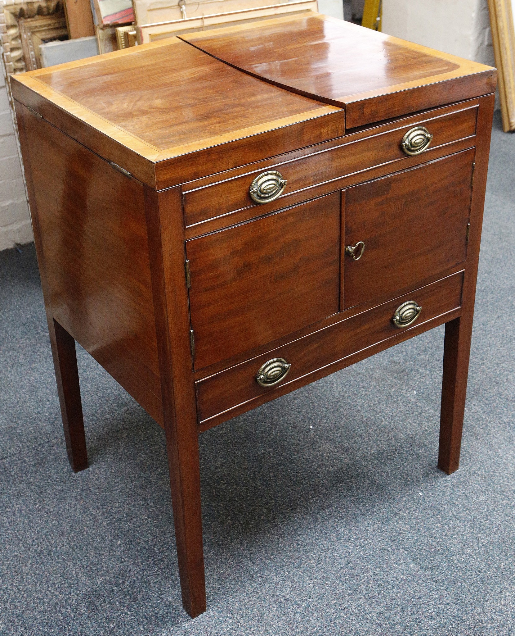 A Georgian walnut and satinwood crossbanded gent dressing chest, with fitted interior, integral