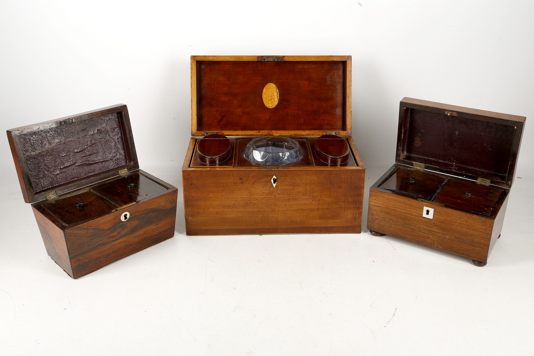 A Georgian mahogany tea caddy, having 2 drop in caddy units with oval lids and a central mixing - Image 2 of 3