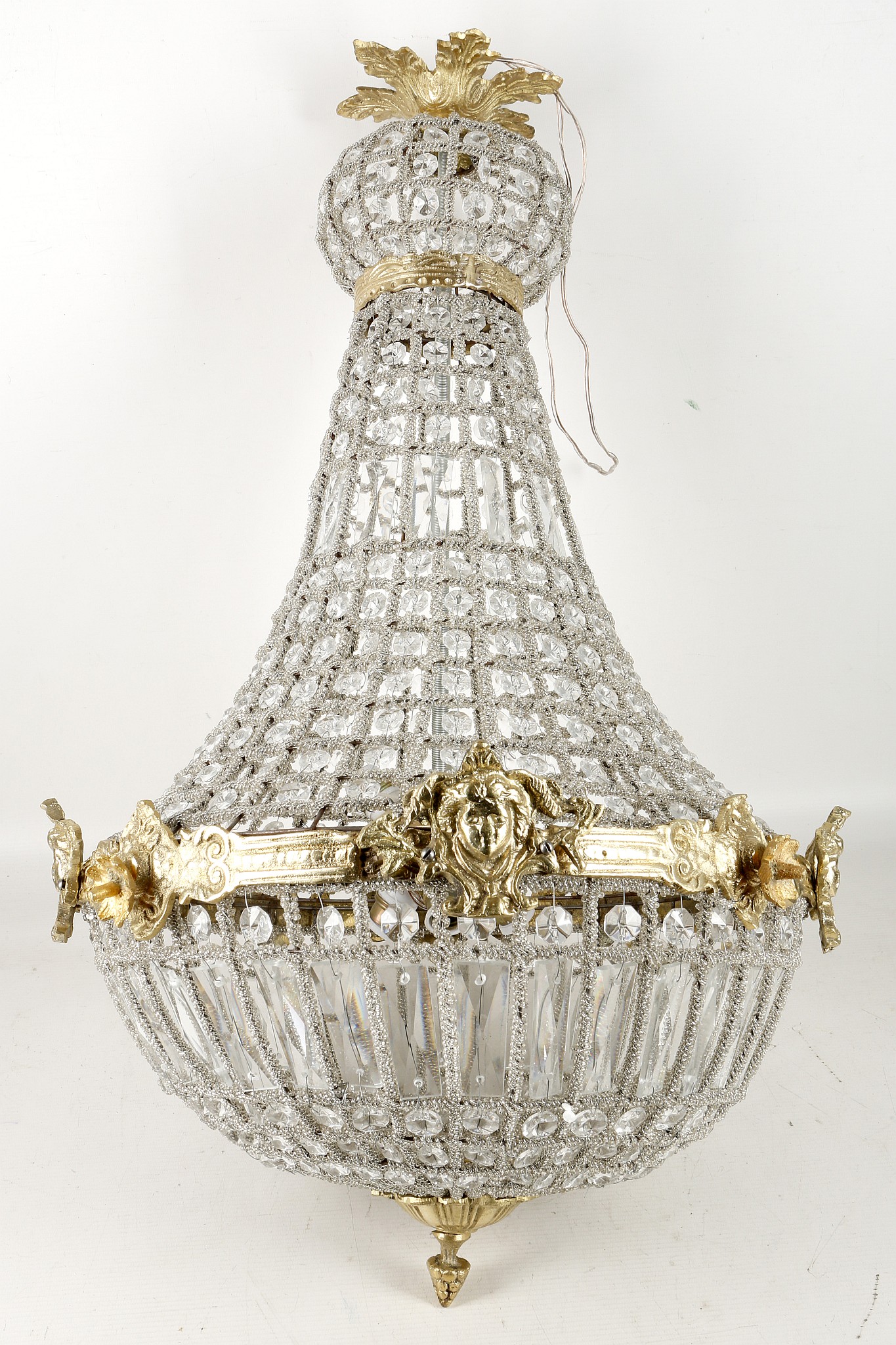 An Empire style pear shape chandelier, brass leaf surmount, mask banding, 68cm high approx.