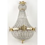 An Empire style pear shape chandelier, brass leaf surmount, mask banding, 68cm high approx.