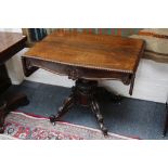 A good quality Victorian rosewood sofa table, with single long frieze drawer, gadrooned edges and