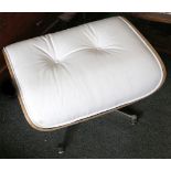 An Eames inspired ottoman, having white faux leather upholstery, raised on chrome base, 41 H x 65