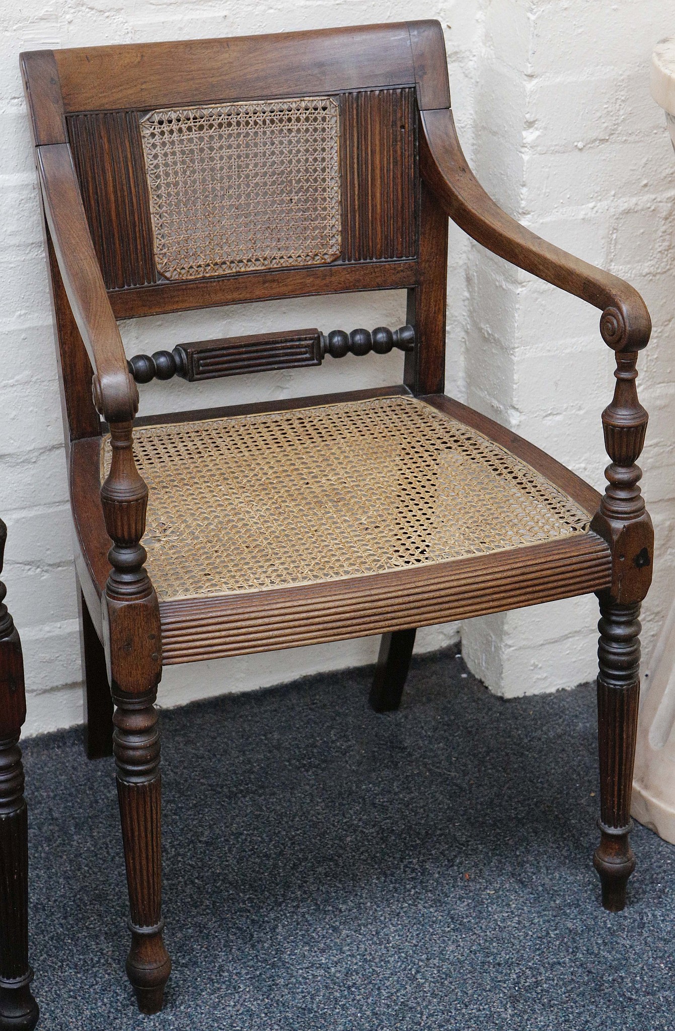 A pair of 19th century Anglo Indian rosewood armchairs, cane back an seat, turned legs. - Image 3 of 3