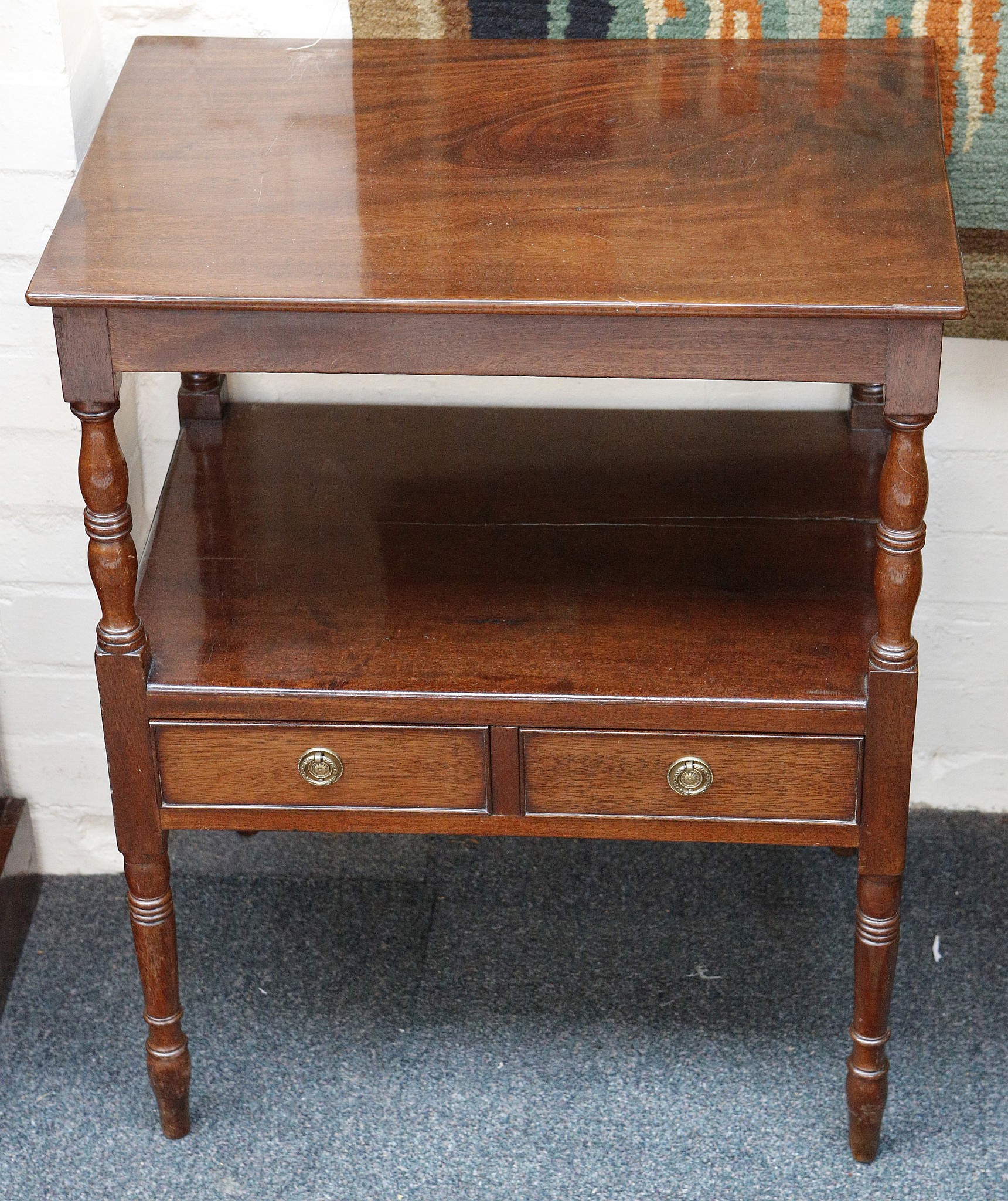 A 19th century mahogany what-not, with two tiers and two drawers (cut-down), on turned legs, 60cm