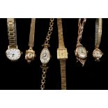 Four various vintage 9ct gold cased ladies wristwatches, to include an oval cased dress watch, a