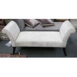 A modern window seat sofa by Jameson Furniture, with sweeping arm at each end, in beige velvet
