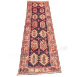 Persian Lori runner. 3.00m x. 0.90m. Condition rating B.