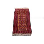 Afghan Belouch rug, 1.40m x 0.84m. Condition rating A/B.