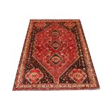 Persian Shiraz carpet, South West Iran, 3.05m x 2.23m. Condition rating B.