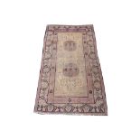 Early 20th century Chinese, Khotan rug. 2.61m x 1.40. Condition rating C.