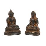 A PAIR OF LACQUERED TERACOTTA BUDDHAS. 19th / 20th Century. Each seated on a double lotus base, with