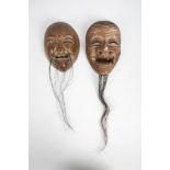 TWO JAPANESE WOODEN MASKS. Meiji era. 19cm H. (2) Provenance: John Marriott (1921-2007) and Count R.