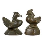 TWO BURMESE BRONZE OPIUM WEIGHTS. 19th Century. 6cm H. (2) Provenance: Spink & Son Ltd., 19th