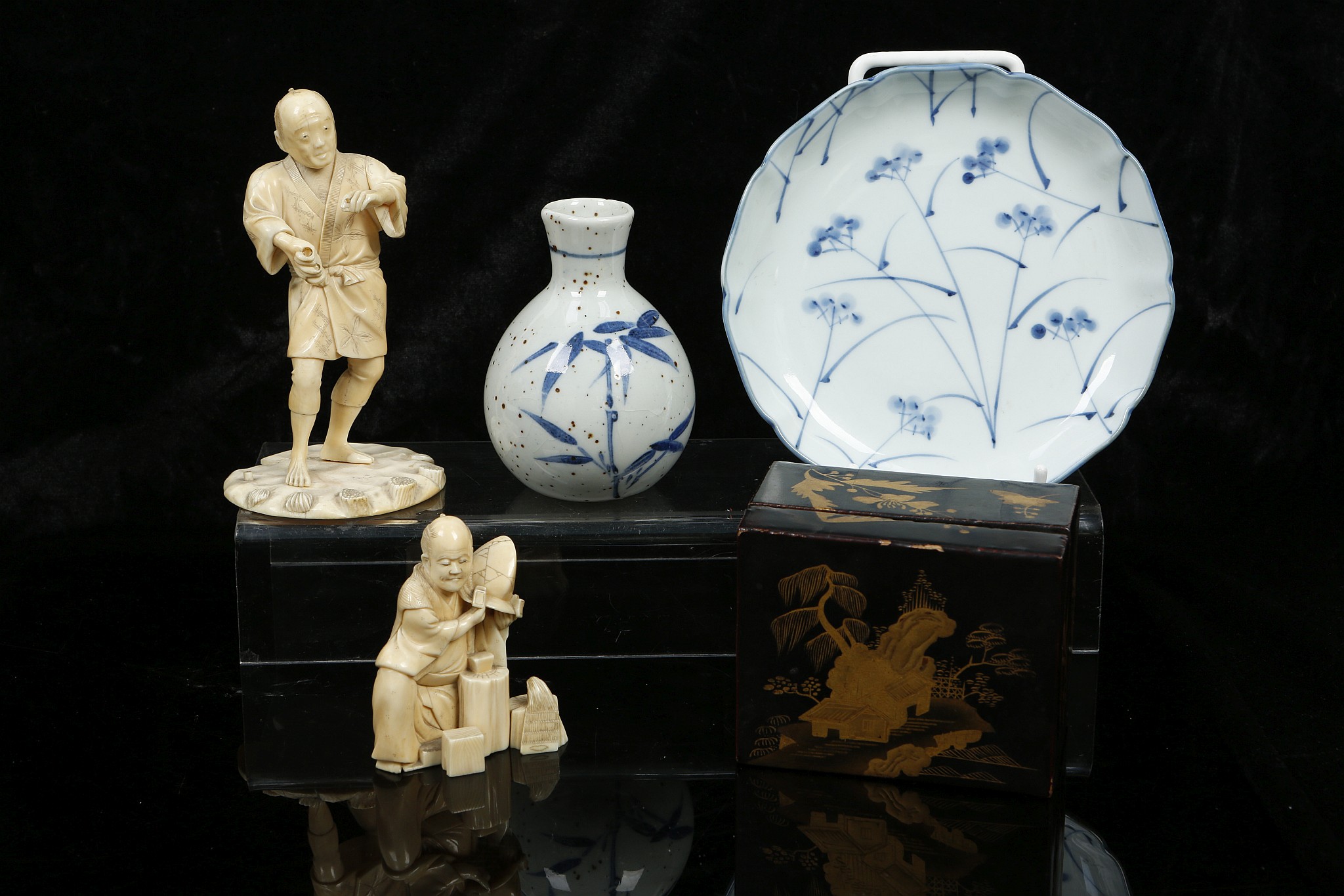 A COLLECTION OF JAPANESE ITEMS. Comprising an okimono carving of a seated warrior, signed