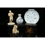 A COLLECTION OF JAPANESE ITEMS. Comprising an okimono carving of a seated warrior, signed