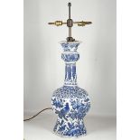 A large 19th century Delft blue and white onion necked vase, fitted as a lamp, but not drilled, 57½