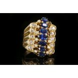An 18ct gold, sapphire, diamond and pearl dress ring.
