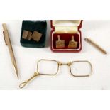 A pair of 9ct gold cuff links, another pair, a 9ct gold pencil, a 9ct toothpick and a pair of