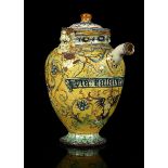 AN ITALIAN MAIOLICA WET DRUG JAR, 19th century, of baluster shape with a narrow spout and integrated