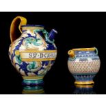 TWO ITALIAN MAIOLICA WET DRUG JARS, 19th century, both of baluster form with a narrow spout and