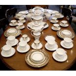 A Royal Doulton bone china part dinner, coffee, tea service for six in 'Baroness' pattern to include