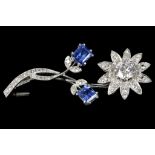 An 18ct white gold, diamond and sapphire set flora